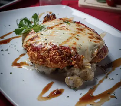 Pechuga a la parmesana